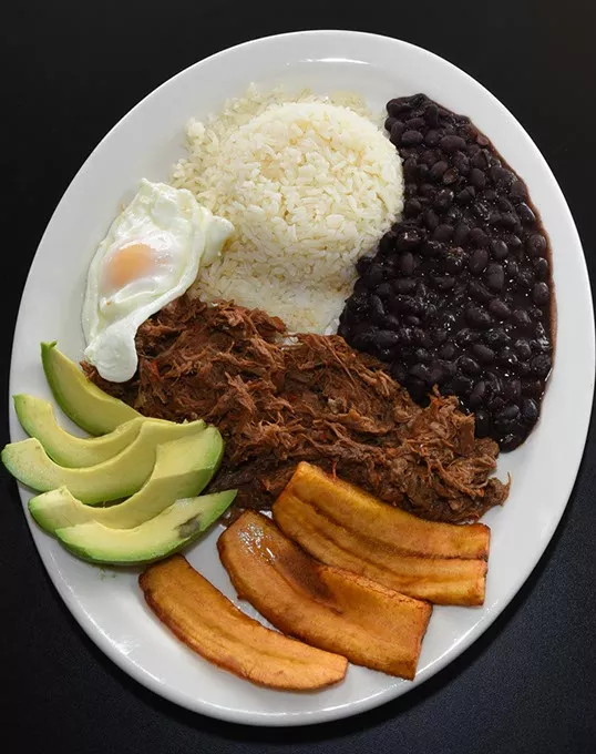 Pabellon (Traditional dish from Venezuela), at Amazonia Latin Flavor in Moore, Oklahoma USA, 10-15-15. - MARK HANCOCK