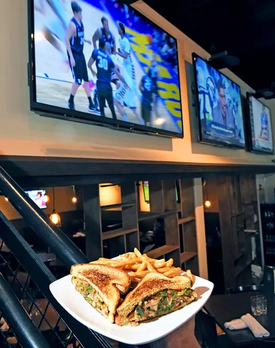The Chupacabra sandwich with fries, at Pub W, 3720 W. Robinson Avenue in Norman, 2-8-16. - MARK HANCOCK