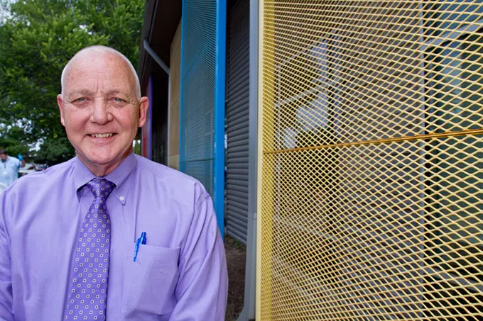 Dan Straughan posing in front of The Homeless Alliance in Oklahoma City, Wednesday, July 22, 2015. - KEATON DRAPER