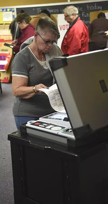 People voting during the recent general election at Highland Park Elementary in southeast OKC, 11-4-14. mh