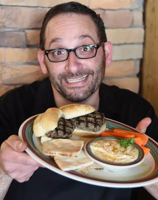 Clayton Fahood presents his kids creation, Kaffa Sliders at Nunu's Mediterranean Cafe. mh