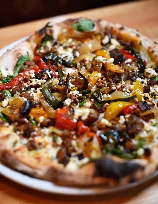 Lamb sausage pizza at Pizzeria Gusto, Tuesday, March 8, 2016. - GARETT FISBECK
