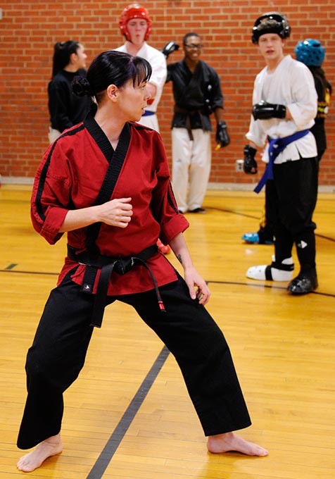 Jennifer Allman does a demonstration for her Martial Arts students at Harding Fine Arts Academy in Oklahoma City, Wednesday, Jan. 21, 2015. - GARETT FISBECK
