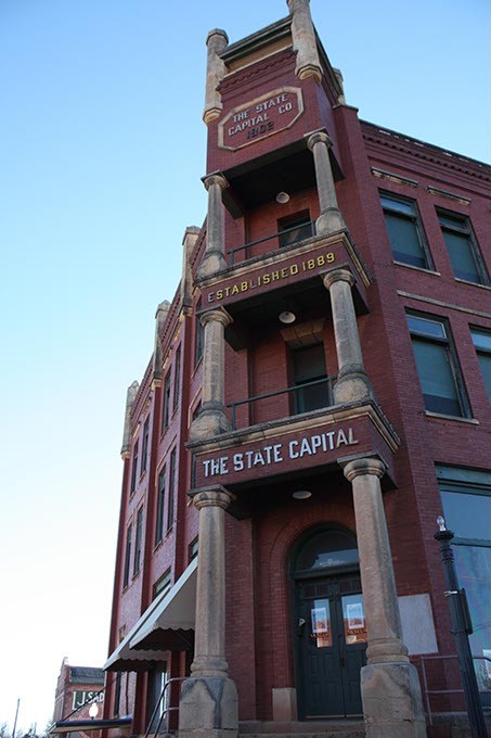 The State Capital Publishing Company Building sits at the intersection of Harrison Avenue and Second Street in Guthrie.  Photo by Laura Eastes - LAURA EASTES
