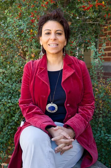 Janette Habashi, founder of Child's Cup Full, poses for a photo at the University of Oklahoma in Norman, Monday, Nov. 23, 2015. - GARETT FISBECK