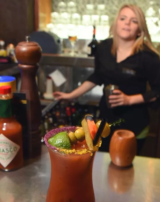 Bar tender action with a Bloody Mary at the bar at Pearls Oyster Bar on N. Classen. mh