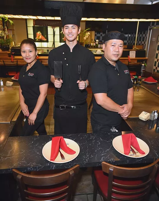 Koto Japanese Steakhouse, from left, Cecilia Haynes-waitress, Shingi Campbell-habachi chef, and Tri Vu-sushi chef. mh