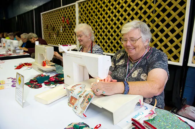 Left Karen Jackson and right, Irene Morgan sew. (Shannon Cornman)