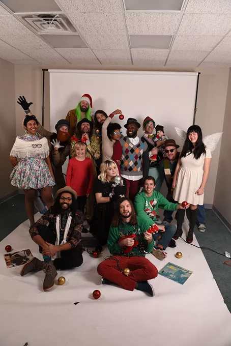 From left, Clarissa “Cid” Castillo (in white shawl), “The Reverend” Justin Hogan (in knit beard) and Taylor “Shraz” Mercier (tan fedora) are Bowley having a ball at Oklahoma Gazette's most recent cover shoot. (Mark Hancock)