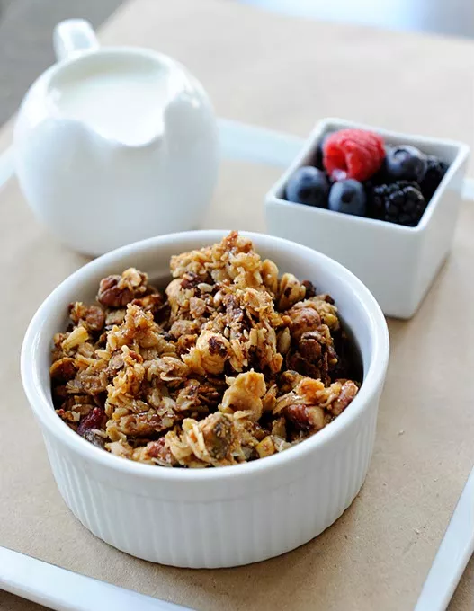 House made granola with berries and milk at Kitchen 324 in Oklahoma City, Thursday, Sept. 17, 2015. - GARETT FISBECK