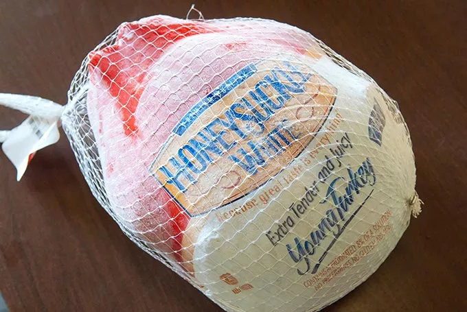 A frozen turkey donated for this year's food basket distribution campaign, in the Jesus House warehouse recently. mh