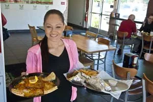 Karen Villareal delivers at Basil Mediterranean Cafe, 211 N.W. 23rd Street in OKC. mh