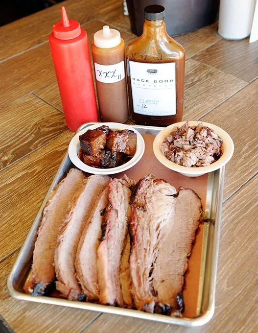 Fat and lean sliced brisket, chopped brisket, and burnt ends, at Back Door Barbecue in Oklahoma City, Monday, Dec. 21, 2015. - GARETT FISBECK