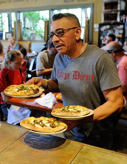 Juan Adame at The Wedge Pizzeria in Oklahoma City, Wednesday, July 1, 2015. - GARETT FISBECK