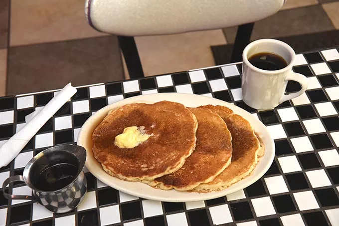 A stack of pancakes at the Hungry Frog Restaurant. mh