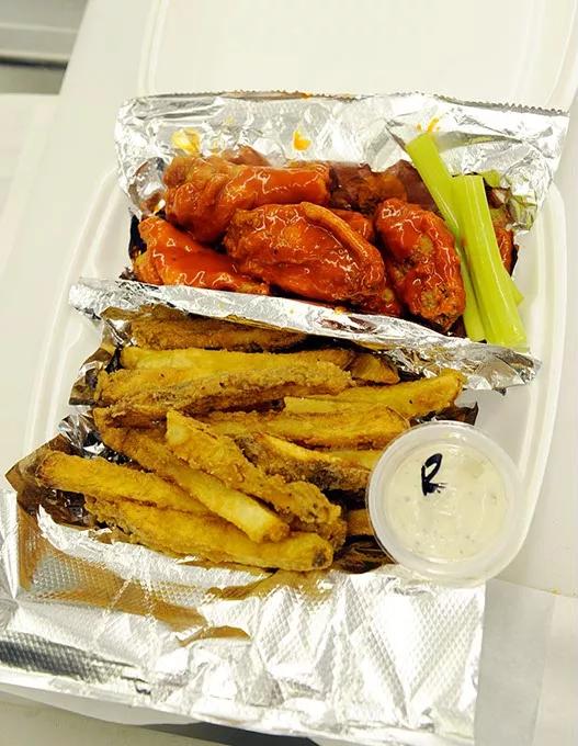 Mild wings and fries at Wings and Things in Yukon, Thursday, Nov. 5, 2015. - GARETT FISBECK