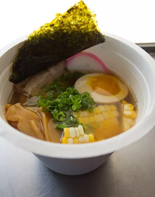 Shot inside food truck of Kaiteki Ramen ingredients: Shoyu (chicken) style broth, fresh noodles, braised pork belly, roasted corn, menma, kamaboko, negi, nori. Monday, August 3, 2015. - KEATON DRAPER