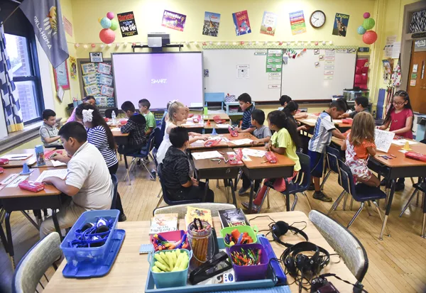 Lori Zehnder's 3rd grade classroom at Linwood Elementary School with Donors Choose supplies in forground, 8-27-15. - MARK HANCOCK