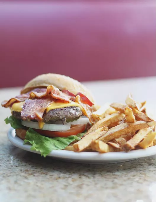 A Wednesday Special, bacon cheeseburger at Sooner Legends in Norman, Okla. - CARA JOHNSON
