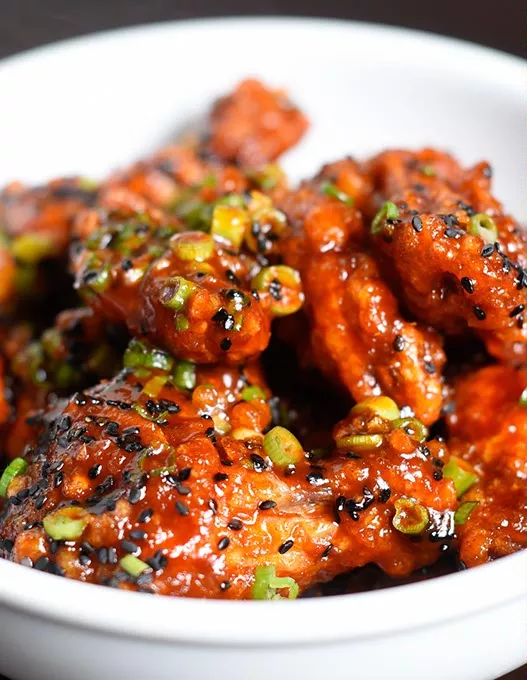 Gochujang wings for Paul Langer's new concept Chicken & Beer, Tuesday, May 17, 2016. - GARETT FISBECK