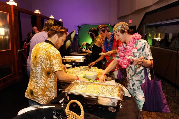 Best of OKC party guests mob the buffet at Will Rogers Theatre during the Aug. 23 appreciation event.