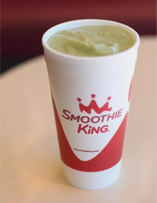 The Vegan - Mango Kale Smoothie at Smoothie King. The smoothie is made with a raw plant-based protein, kale, a mango juice blend, bananas, apple juice and almonds. - CARA JOHNSON