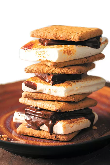 homemade marshmallow s'mores with chocolate on crackers - BIGSTOCK