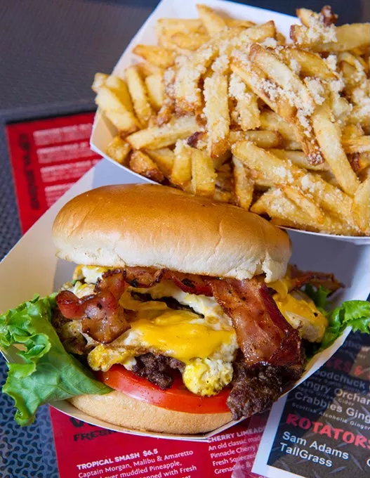 The Egg-O-Nater with bacon and a side of garlic and parmesan french fries at The Garage.Photo/Shannon Cornman - SHANNON CORNMAN