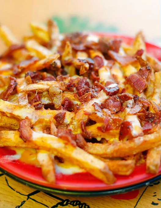 Bacon cheese fries at Eskimo Joe's in Stillwater, Thursday, Aug. 6, 2015. - GARETT FISBECK