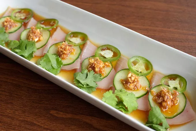 Hamachi ajillo at Yuzo Sushi Tapas Friday, April 14, 2017. - GARETT FISBECK