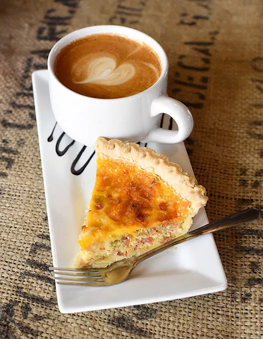 Homemade bacon quiche and mocha latte at Wild Hero Coffee Co. in Mustang, Wednesday, March 9, 2016. - GARETT FISBECK