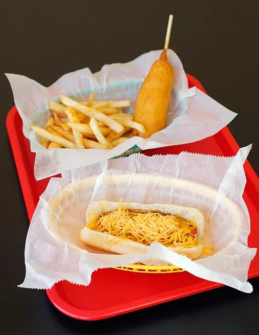 Chili cheese dog, corn dog and fries, at Coneys-N-More, Thursday, June 29, 2017. - GARETT FISBECK