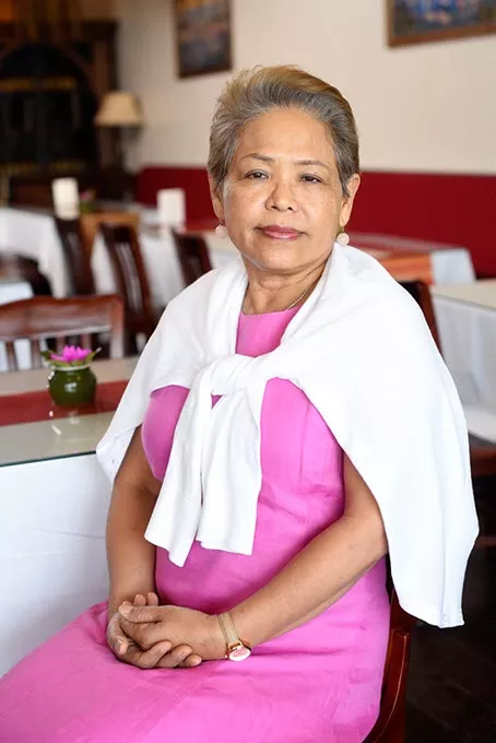 Lawan Rattana poses for a photo at Gin Thai Fusion in Edmond, Monday, May 16, 2016. - GARETT FISBECK