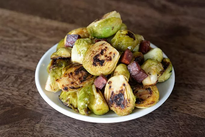 Brussels sprouts with Spanish chorizo at The Pritchard, Wednesday, March 22, 2017. - GARETT FISBECK
