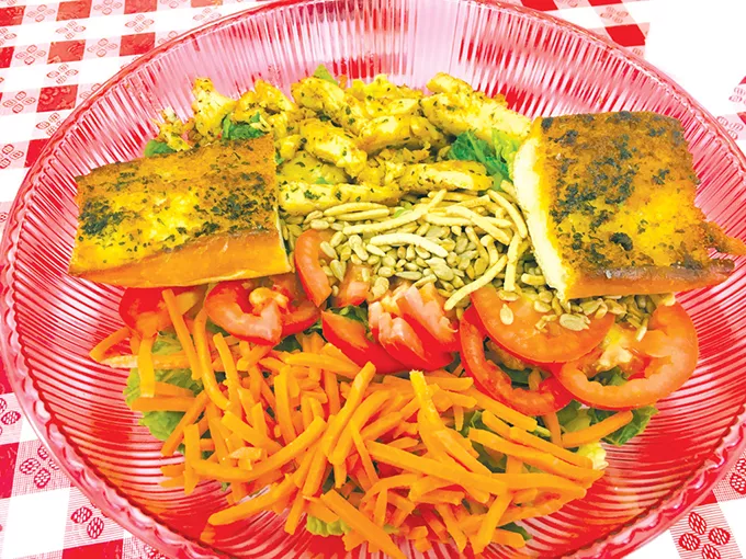 The Bangkok Thai salad with garlic bread - JACOB THREADGILL