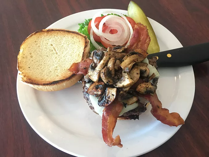 The mushroom bacon Swiss burger was nicely complemented by garlic basil mayonnaise. - JACOB THREADGILL
