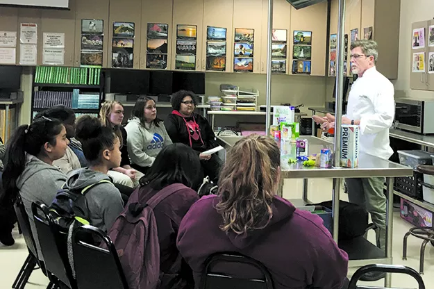 Restaurateur Rick Bayless gives OKCPS students a cooking class. - NAZARENE HARRIS
