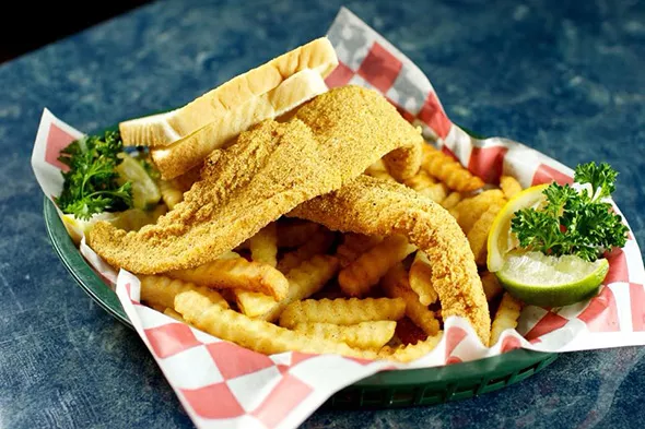 A lunch catfish plate with french fries and bread - PROVIDED