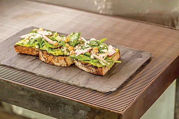 Avocado toast with farm greens, buttermilk dressing, cherry tomatoes, shallots and sunflower seeds is part of Mother’s Day brunch at Mary Eddy’s Kitchen x Lounge - PROVIDED
