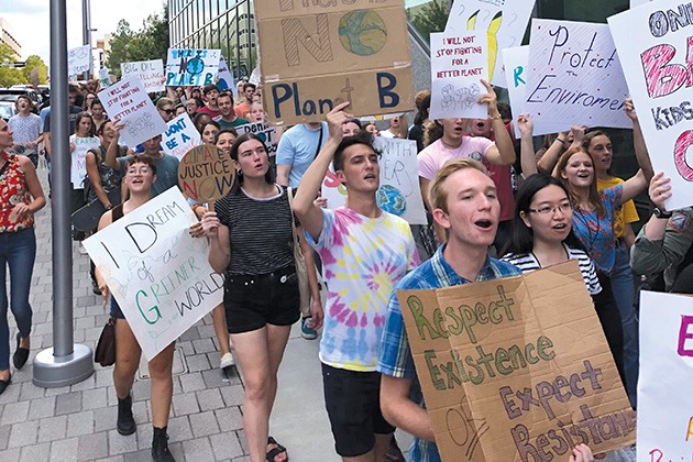 Hundreds of Oklahomans took to downtown last week as part of the global youth climate strike to call attention to the climate crisis. - PROVIDED