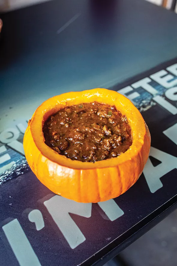 Pumpkin chili served in hollowed-out pumpkin - ALEXA ACE