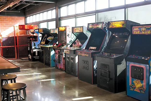 Gamers Arcade Bar, which features various arcade games, a mural by a local artist and a full-service bar, is connected to the comedy club. - ALEXA ACE