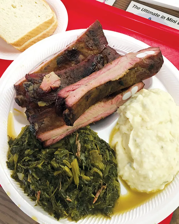 A rib dinner at George’s Happy Hog Bar-B-Q with “marvelous” mixed greens and “perfect” potato salad - JACOB THREADGILL