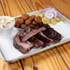 Rib dinner with fried okra and coleslaw at Texlahoma BBQ in Edmond, Tuesday, Dec. 13, 2016. Rib dinner with fried okra and coleslaw at Texlahoma BBQ in Edmond, Tuesday, Dec. 13, 2016.