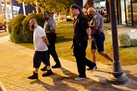 Members of the Satanic church Dakhma of Angra Mainyu are arrested after starting a fight following a showing of the film "The Real Enemy" during the DeadCENTER Film Festival at Harkins Theatre in Oklahoma City, Thursday, June 11, 2015. - GARETT FISBECK