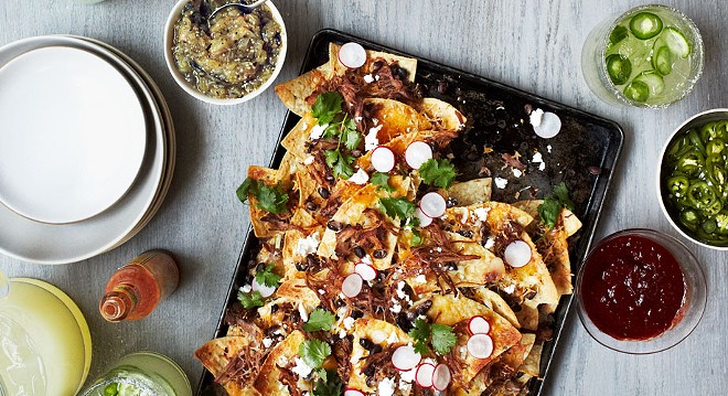 Truly epic nachos take a bit of work, but it's so worth it. - PHOTO BY CHRISTINA HOLMES FOR BON APPETIT