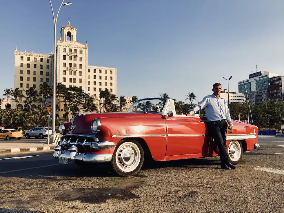 Josué and his convertible, Marilyn - PHOTO BY ROB BARTLETT