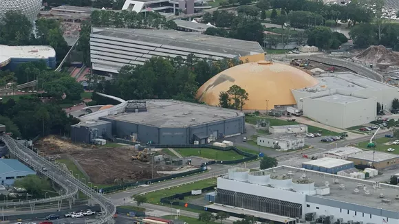 The land clearing for the new space-themed restaurant is now visible. The small, box-like unfinished corporate lounge can be seen in the middle left of the image adjenct to the Mission: Space attraction. - IMAGE VIA BIORECONSTRUCT | TWITTER