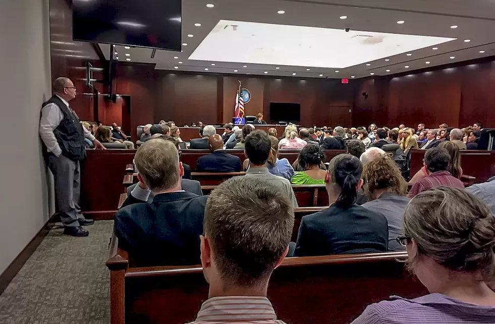 Dozens of J20 defendants and their supporters pack into D.C. Superior Court for a preliminary hearing on June 9, 2017. - PHOTO BY GEORGE JOSEPH