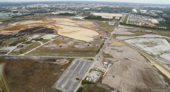 Site work where Universal's new south campus theme park is expected to be going. The theme park will be located in the center left with the parking lot on the righthand side of the image. - PHOTO BY BIORECONSTRUCT VIA TWITTER